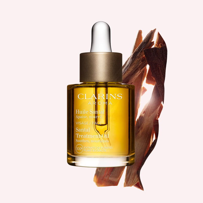 Clarins Santal ansiktsbehandlingsolje med hundre prosent rene planteekstrakter for &aring; dypt n&aelig;re og lindre veldig t&oslash;rr hud.