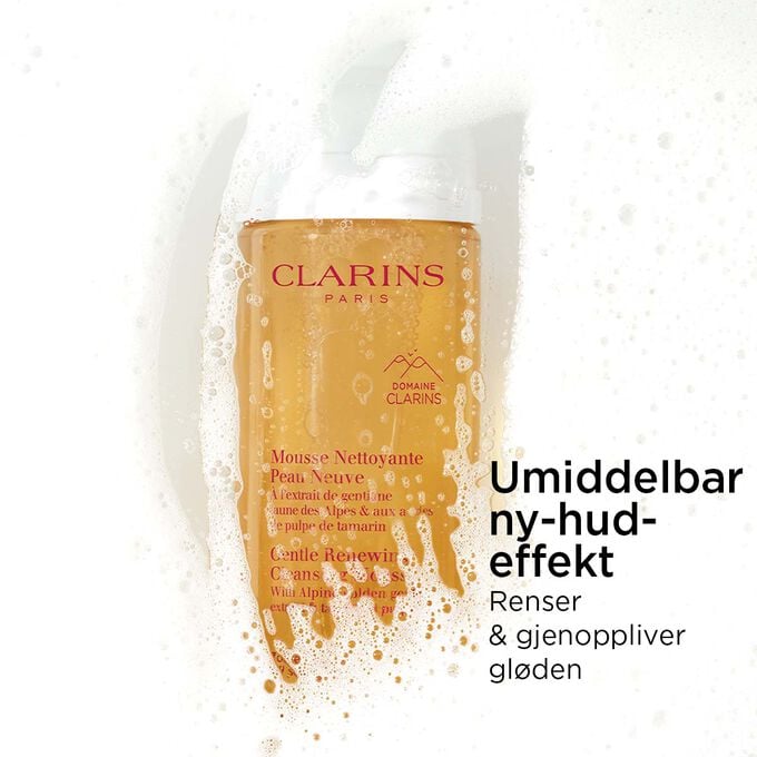 Packshot av den oransje flasken med skummende ansiktsrens under skum med tekst om dens ny-hud-effekt.