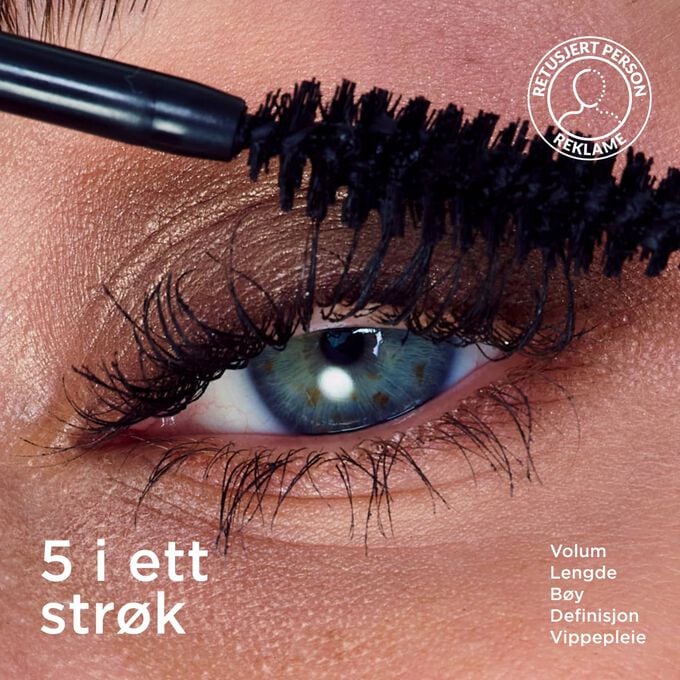 Fokus p&aring; en kvinnes vipper ved p&aring;f&oslash;ring av Clarins Curl Defining Mascara, som viser volumgivende effekt, b&oslash;y, definisjon og vippepleie.