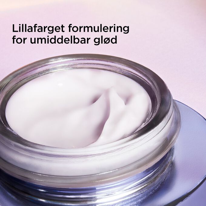 Nutri-Lumière Revive olje med lillafarget formulering for umiddelbar glød