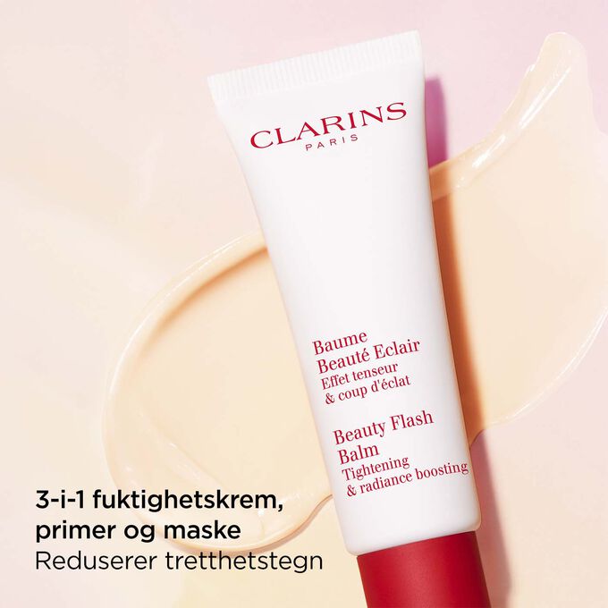 Pakkebilde av Clarins Beauty Flash Balm mot en strukturert bakgrunn som fremhever de nærende egenskapene for trett hud.