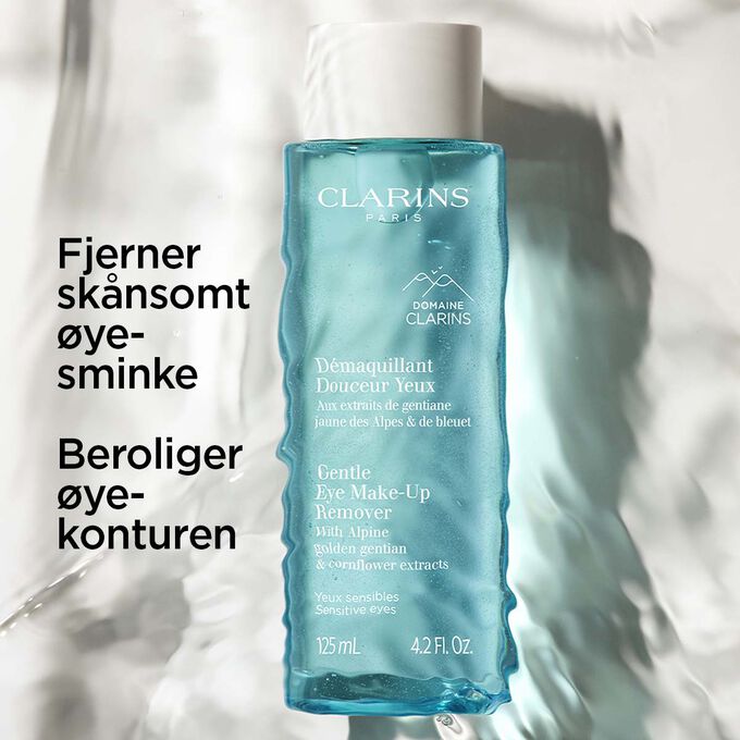 Packshot under vann av Clarins &oslash;yesminkefjerner med tekst om produktets beroligende og sk&aring;nsomme egenskaper.