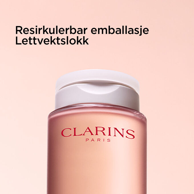 Fokus p&aring; toppen av flasken med micell&aelig;rvann for &aring; illustrere den resirkulerbare emballasjen og det lette lokket.